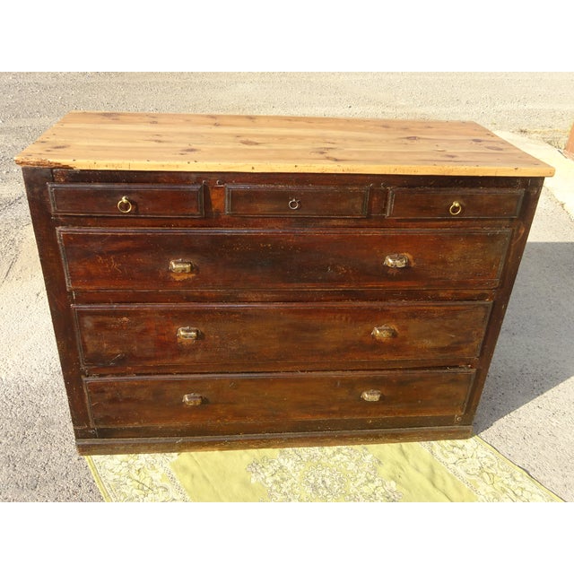 19th-century counter unit with a 2.7 cm thick pine top. It features three small drawers and three very large drawers, all...
