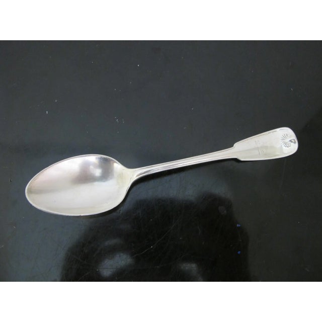 Tiffany & Co. antique sterling silver dessert spoon set of 4, c1871 in palm design with bird engravings at upper handle....