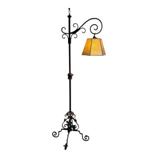 1910s Elaborate Bent Brass and Wrought Iron Spanish Revival Floor Lamp With Golden Mica Shade For Sale