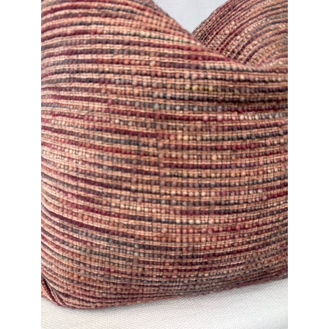 Custom pair of 22" pillows covered in Weitzner Fabrics "Altitude" in color warm. These pillows have tapered corners to...