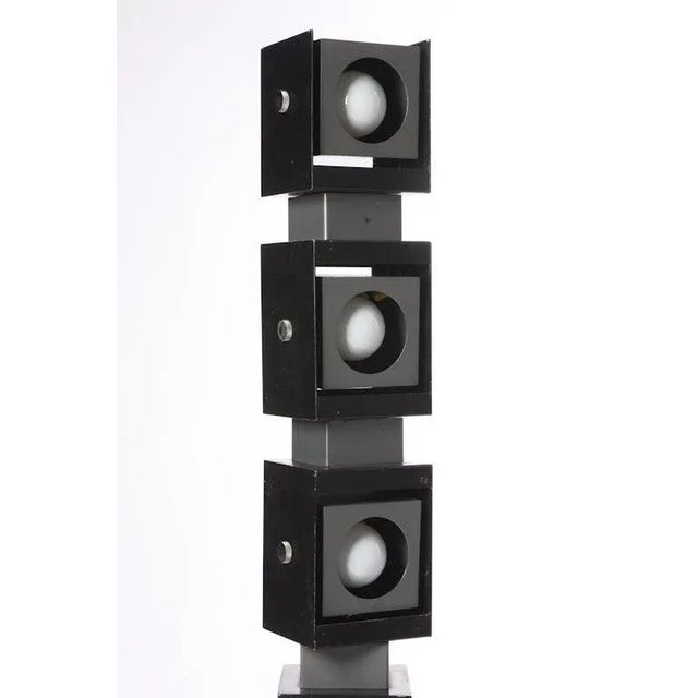 Italian adjustable steel floor lamp by Irving Richards for Arteluce is superbly crafted and swivels horizontally and...