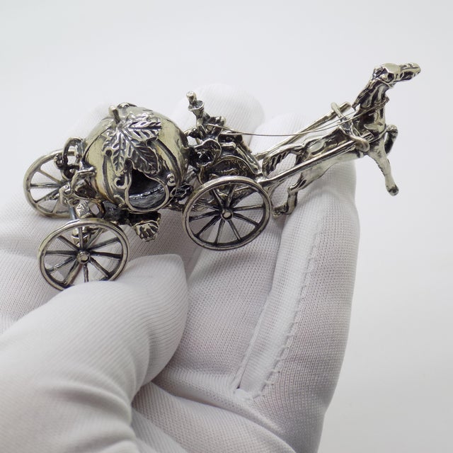 Charming vintage miniature depicting Cinderella’s pumpkin carriage, handcrafted in Italy between the 1980s and 1990s in...