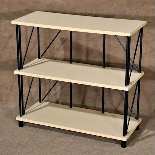 Industrial style shelving unit with black metal frame. Please confirm location.