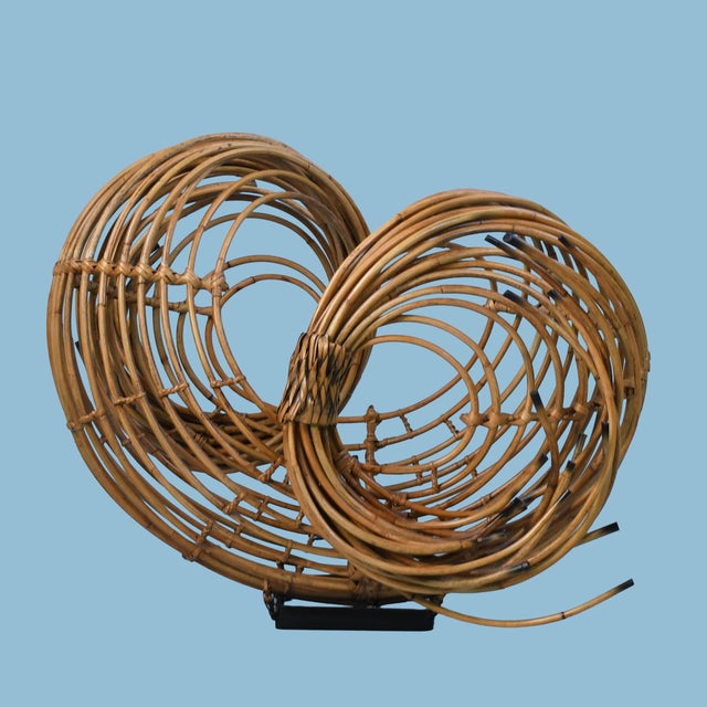 Add sculptural artistry to your space with this vintage Palecek reed sculpture. Handcrafted from natural reed, this...