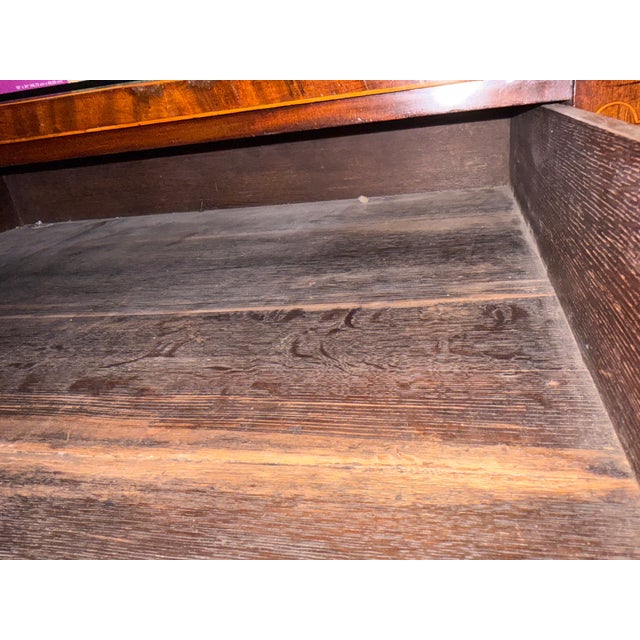 This is an authentic, high-quality English George III mahogany sideboard of grand, estate-scale proportions, featuring a...