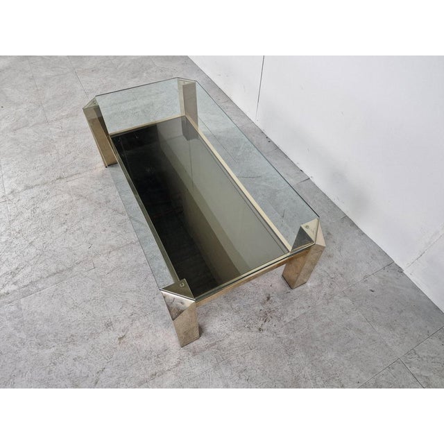 Quality 24kt gold layered and thick clear glass coffee table manufactured by Belgochrom. Belgochrom produced quality...