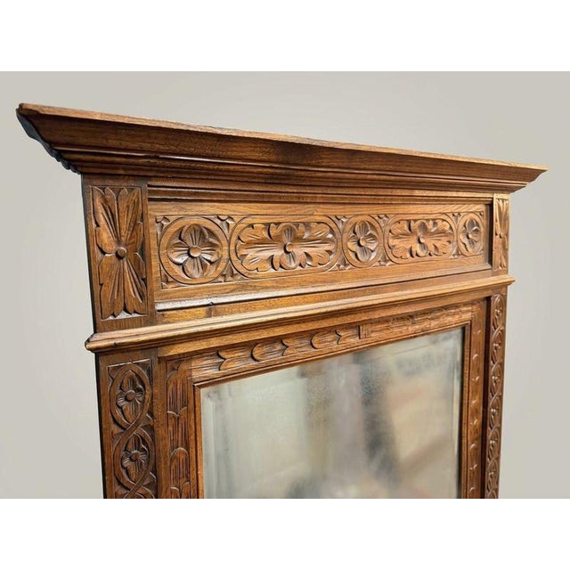 his beautiful late 19th century Belgian Gothic Revival wall mirror is masterfully hand carved in solid oak. The impressive...