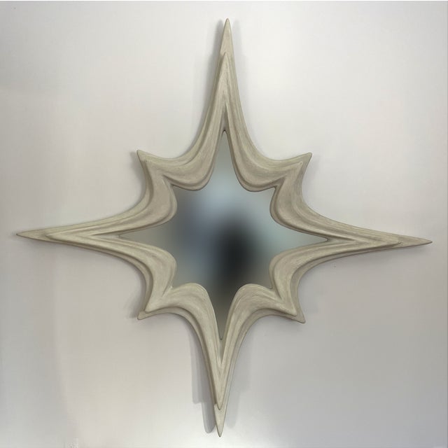 Mirror No. 3 is a large-scale wall-mounted mirror object designed by Chris Delmar. Its broad, symmetrical form combines a...