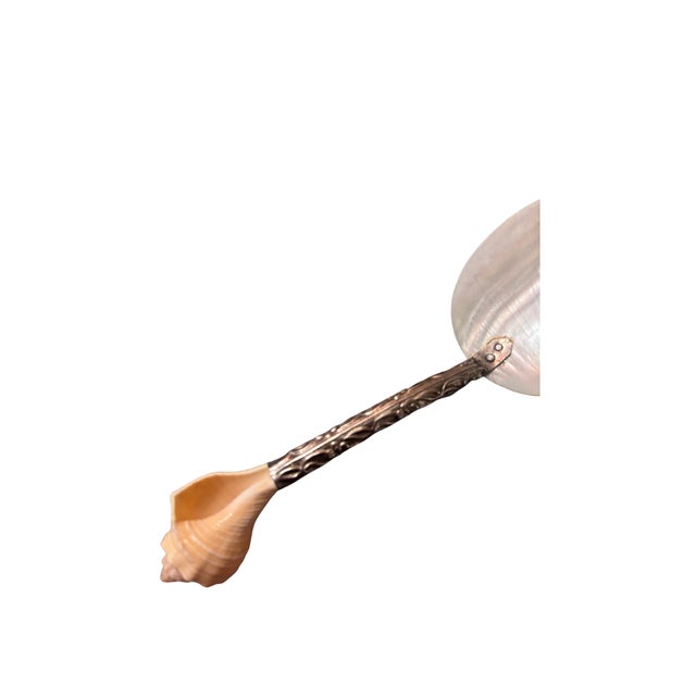 Vintage sterling silver and mother of pearl caviar spoon, mid 20th century.