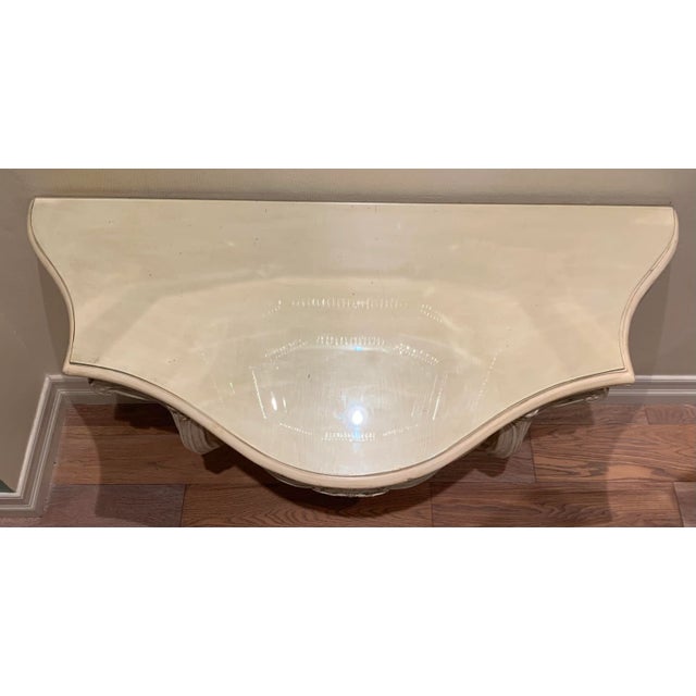 Vintage hand carved French wall console table with glass top.