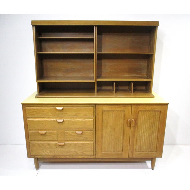 A very well crafted 2-piece ceruse oak sideboard display cabinet with a wonderful angled breakfront design. The top has...