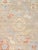 Expertly hand-knotted from fine wool, this Turkish Oushak rug showcases the collection's signature large-scale semi-...
