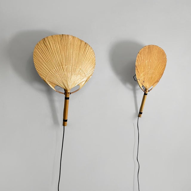 Italian modern wall lamp Uchiwa by Ingo Maurer for M-Design, 1970s Pair of wall lamps model Uchiwa in bamboo. The shade is...