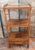 We are selling this gorgeous English Regency or Anglo-English Rosewood Etagere. This etagere has three main shelves, the...