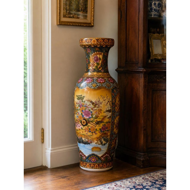 A striking vintage Chinese Satsuma-style porcelain floor vase featuring exceptionally elaborate polychrome decoration,...