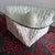 Natural & Organic postmodern Mactan stone coffee table. Triangular glass atop a stone base & Orb. Matching side Table,...