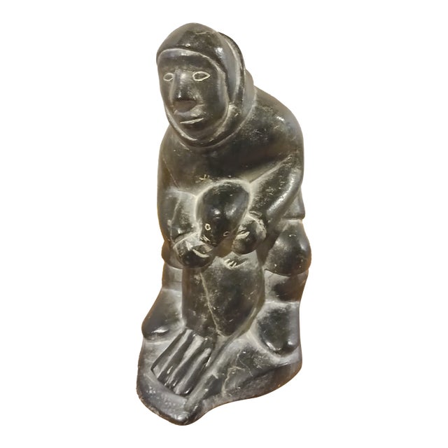 Artist Signed Vintage Inuit Soapstone Sculpture of a Hunter With Seal For Sale