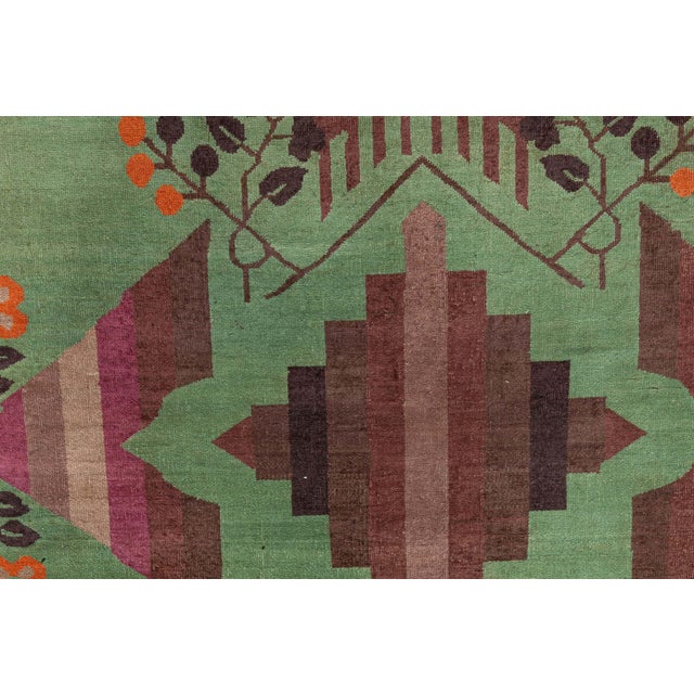 Vintage Chinese Deco Rug with Emerald Green Field and Geometric Medallion Size: 8'0" × 15'5" (243 × 469 cm) This vintage...