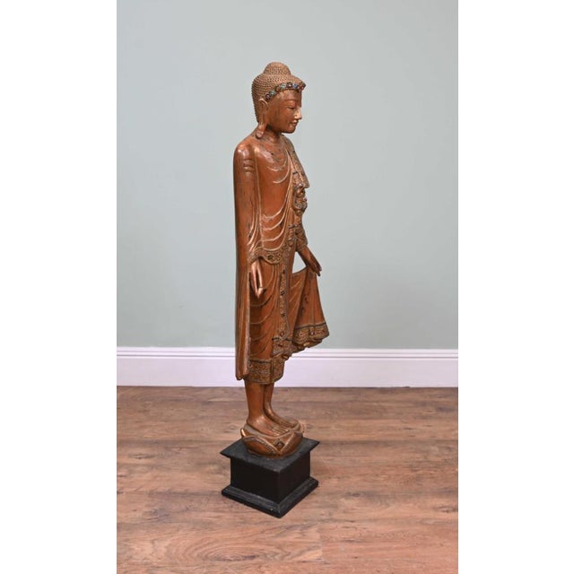 Charming carved standing wooden Thai buddha statue in fantastic condition This would add calm and serenity to any room or...