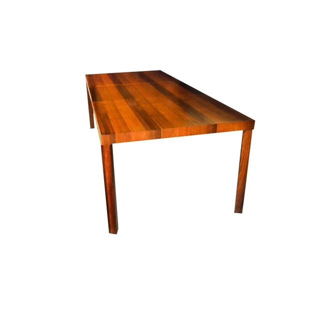 A spectacular tri-wood Mid-Century Parsons dining table by Dyrlund of Denmark, circa 1960. This beautiful vintage Parsons...