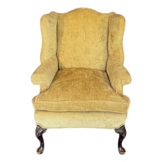 Mid 20th Century Tan Wingback Armchair For Sale