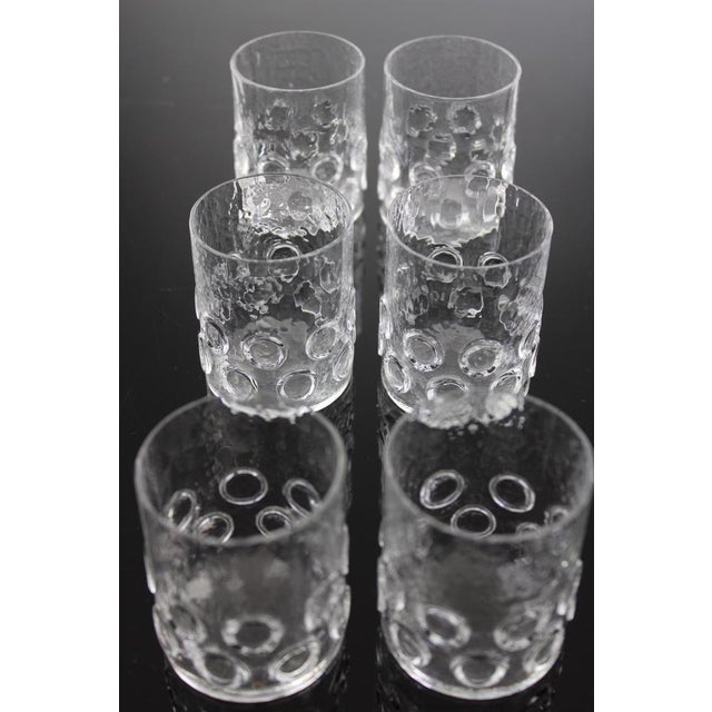 6 Schnapsgläser der Tiroler Glashütte Riedel, aus der Serie "Evergreen", Ätzsignatur, in die Form geblasen. This piece has...