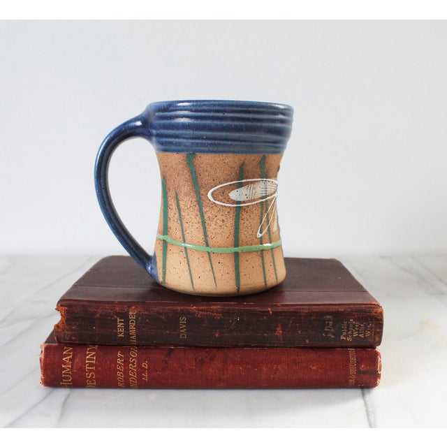 Vintage signed studio art pottery mug with dragon motif. Minor age wear. No chips or cracks.