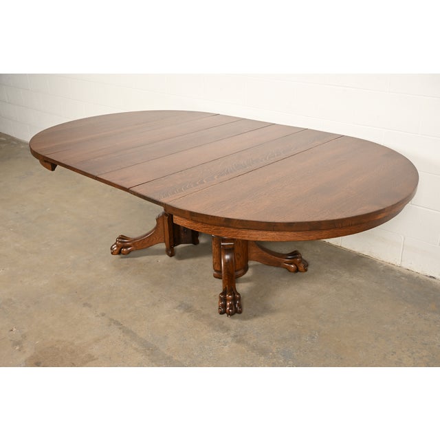 R. J. Horner Style Antique Victorian Carved Oak Split Pedestal Extension Dining Table With Lion Paw Feet | Newly Refinished For Sale - Image 9 of 14