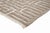 This hand-knotted wool rug in Light Taupe and Ivory features a bold geometric maze-inspired pattern that creates a strong...