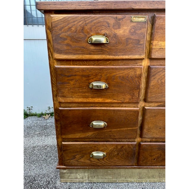 Workbench from around the 1940s. Divided into 16 large and deep drawers, with metal handles. The cabinet is made of solid...