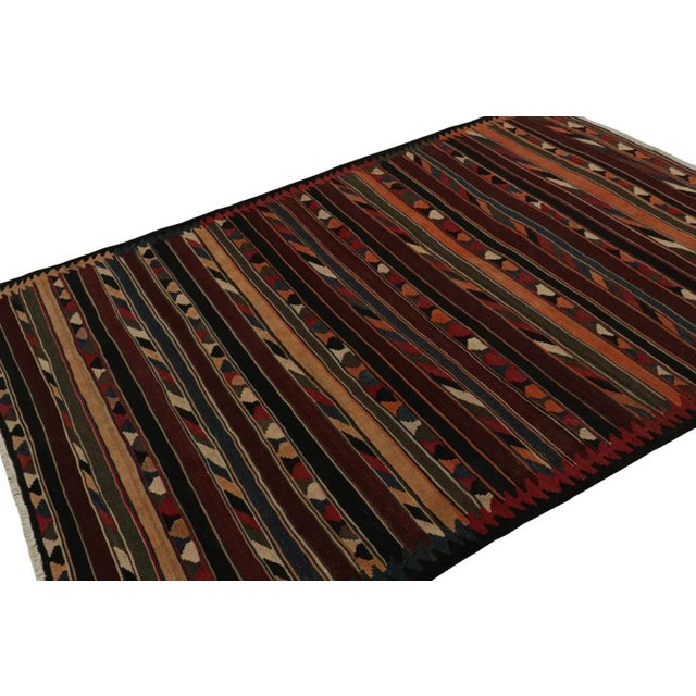 This vintage 5x8 Persian Kilim is a mid-century tribal rug - latest to join our Kilim & Flatweave collection. On the...