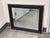 Design Plus Gallery presents a Contemporary Rectangular Wall Mirror from BP Industries. This mirror showcases a wide black...