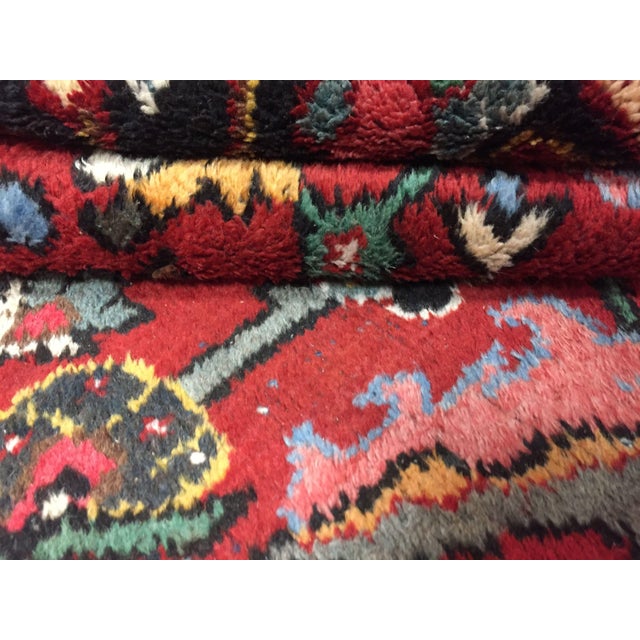 A beautiful hand-knotted rug, traditionally crafted by skilled artisans using fine-quality wool. The hand-knotted...