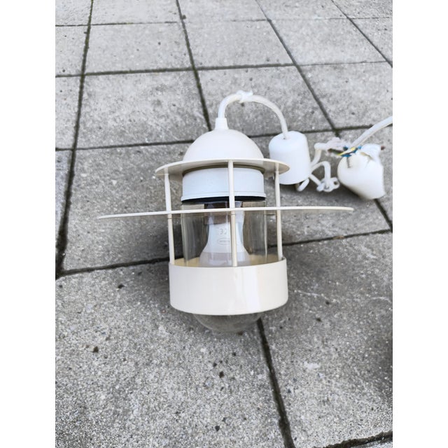 A pair of Danish ceiling lights, model: Albertslund by Jens Möller Jensen for Louis Poulsen. The lamps are in used...