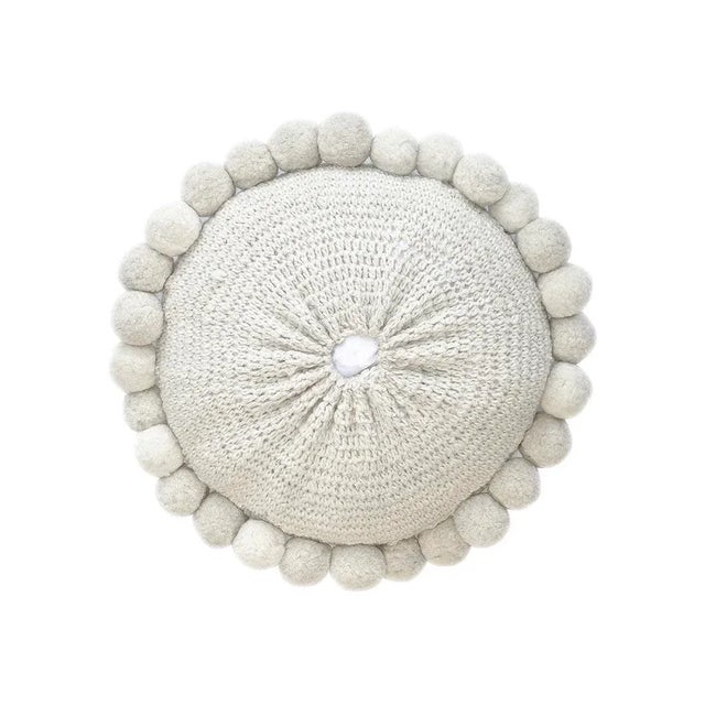 Pure sheep wool cushion, hand-woven and hand-dyed with natural dyes by communities in northern Argentina.