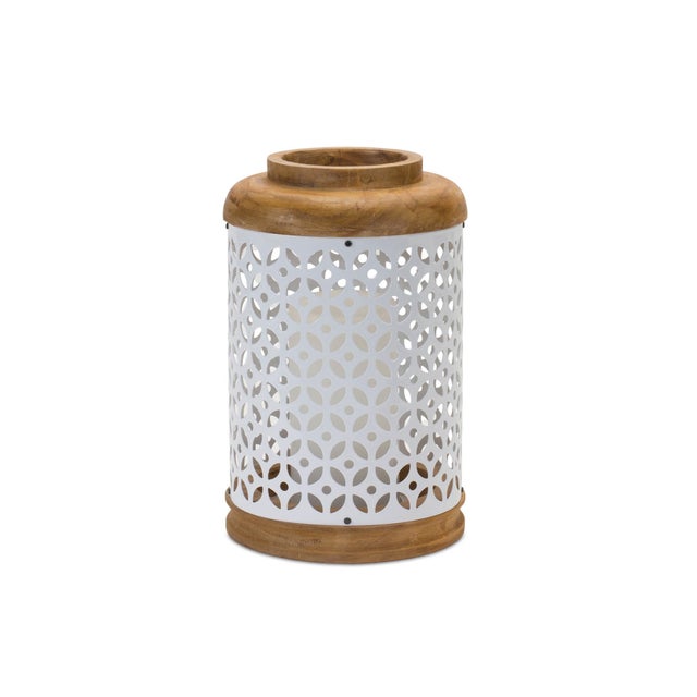 Illuminate your home with the timeless elegance of the Geometric Punched Metal Lantern Set. Featuring intricate metalwork...
