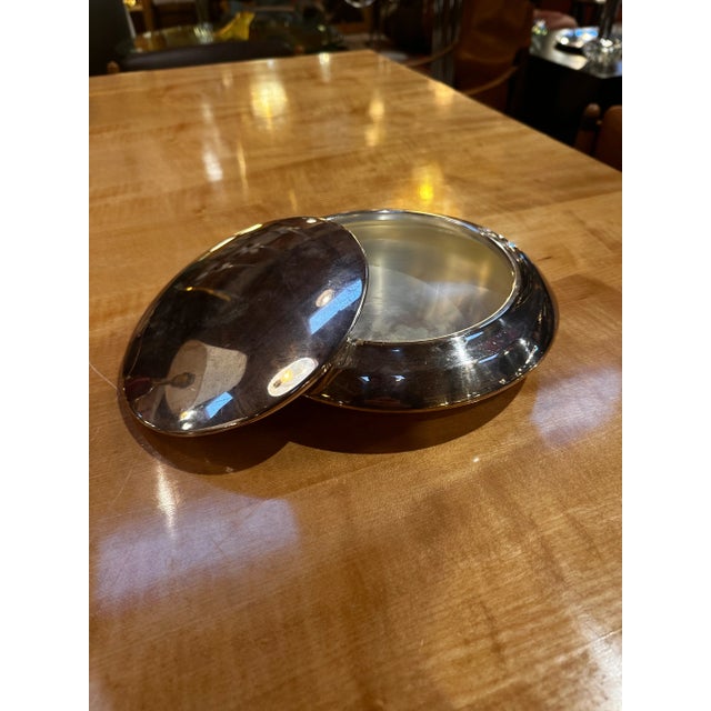 A Mid-Century Italian Decorative Center Bowl from the 1960s is a stylish and iconic piece featuring the design...