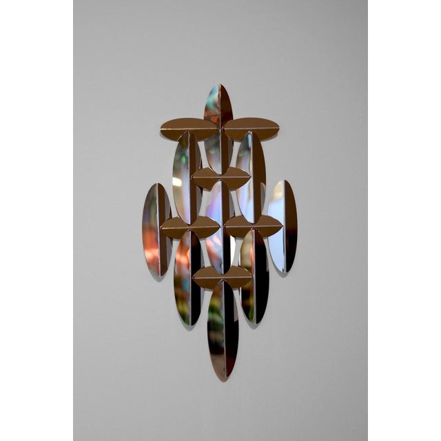 Ino medium wall mirror in polished aluminum by martens & visser dimensions: d 5 x w 28 x h 50 cm. Materials: aluminum....