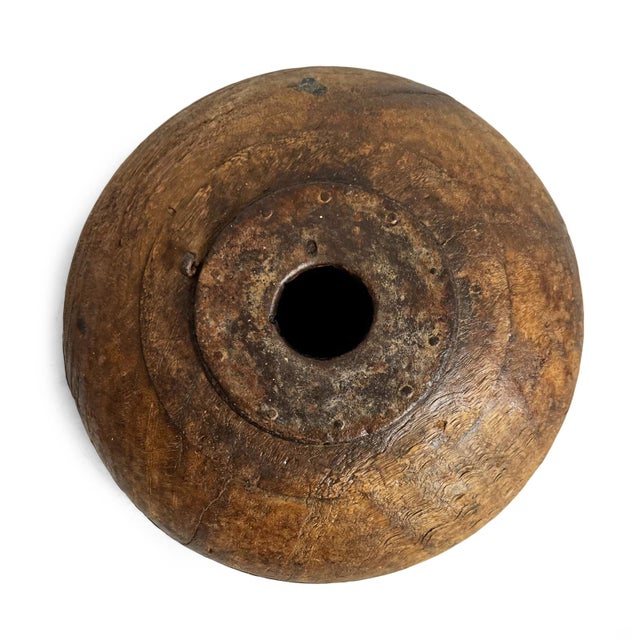 Antique old wooden tobacco container from India. Adorned with metal decorative details. Each is unique and sold individually.