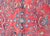 A beautiful early 20th century Persian Lilihan rug with a mirrored floral pattern with myriad floral clusters, surrounded...