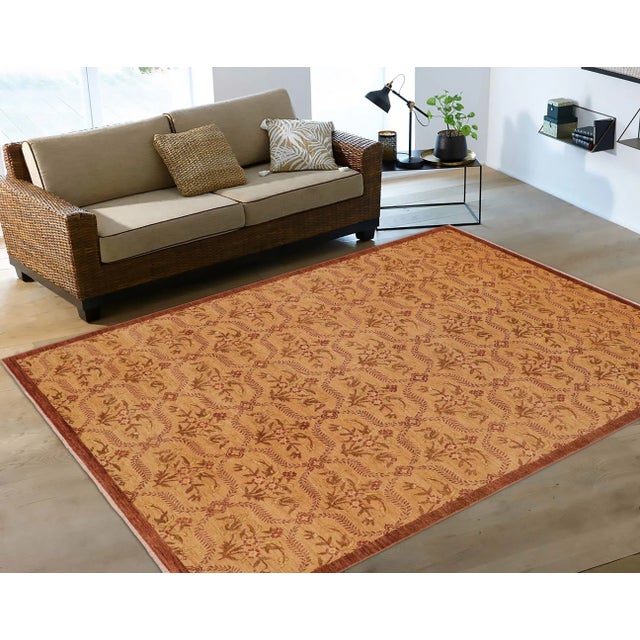 "Enhance the ambiance of your home with this magnificent Persian-influenced Turkish hand-knotted rug made by skilled...