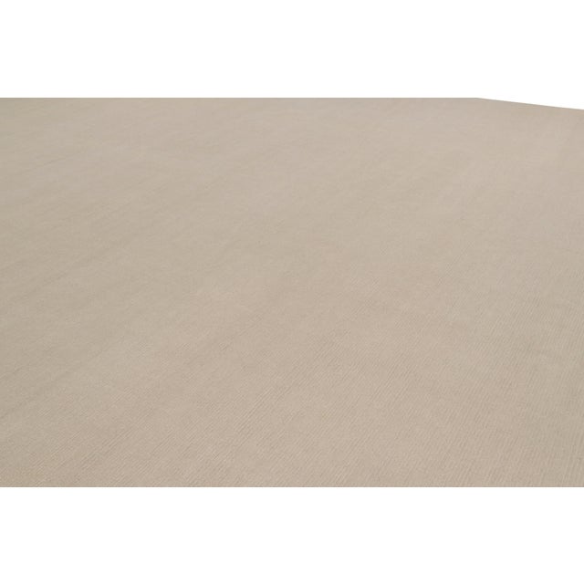 Hand-knotted in wool and cashmere, this 15x24 contemporary rug is the newest addition to the Rug & Kilim Textural...