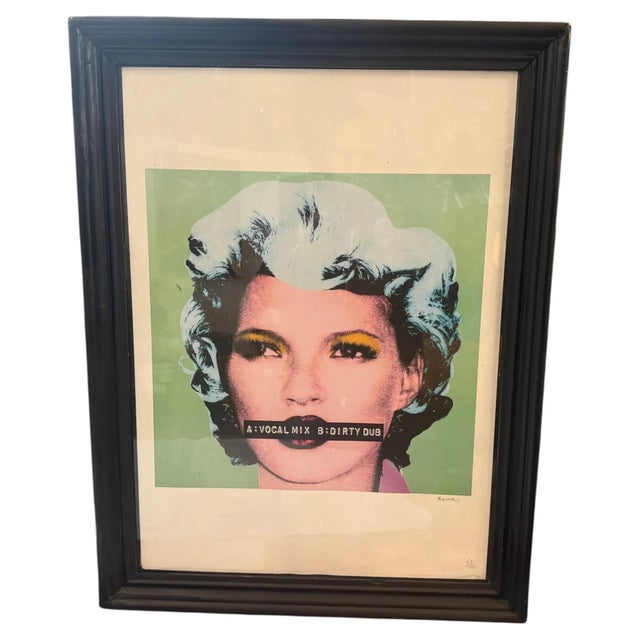 This 21st-century limited edition lithograph features Banksy’s iconic pop-art portrait of supermodel Kate Moss, inspired...