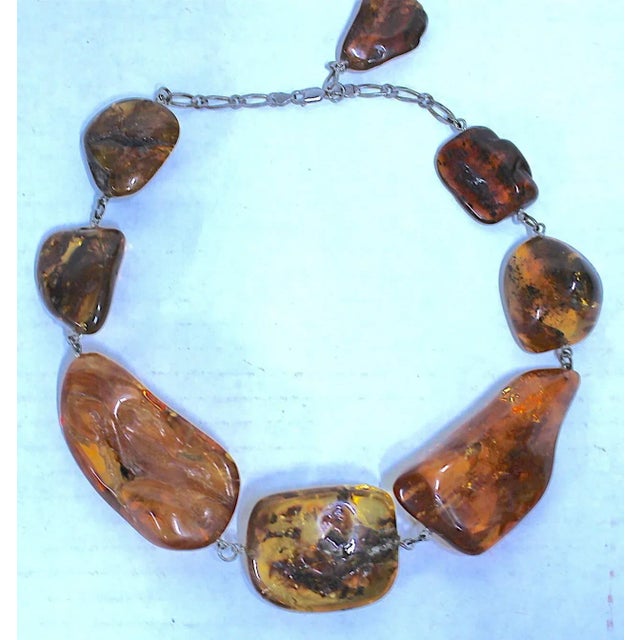 This is part of Chairish’s Fine Jewelry assortment. The exquisite rare massive ancient natural Baltic "dollop" of...