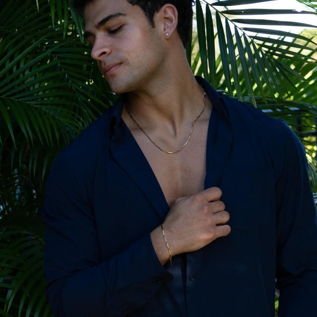 Add timeless elegance to your style with the Golden Strength Men’s Chain Bracelet. Crafted from durable stainless steel...