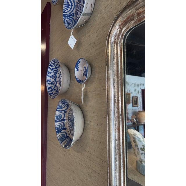 **19th-Century Spanish Ceramic Lebrillo, Granada** A striking glazed earthenware lebrillo from Granada, hand-painted in...