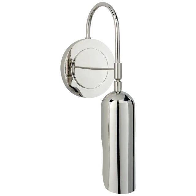 Lucien Functional Wall Light in Polished Nickel Designer: Kelly Wearstler Height: 15.25" Extension: 6.5" Backplate: 5"...