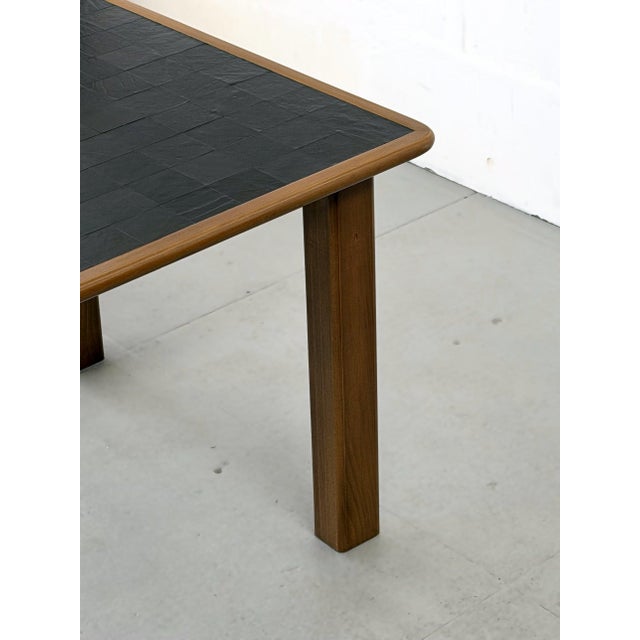 Franco Vattolo designed this dining table for Ibisco in the 1970s, built on a simple idea: stitch leather the way a tailor...