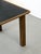 Franco Vattolo designed this dining table for Ibisco in the 1970s, built on a simple idea: stitch leather the way a tailor...