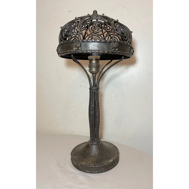 Crafted with an eye for the unique, this Rare Antique Art Deco table lamp brings a touch of vintage elegance to any space....